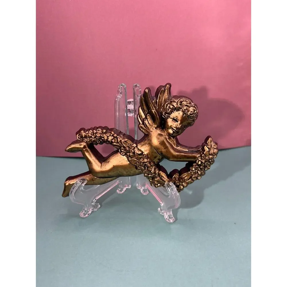 Syroco Gold-Accented Cherub Set with Lei Wall Hangings Lot of three (3)